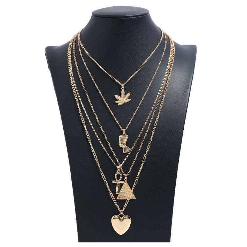 maple leaf pendant, multilayer necklace, triangle love pendant - available at Sparq Mart